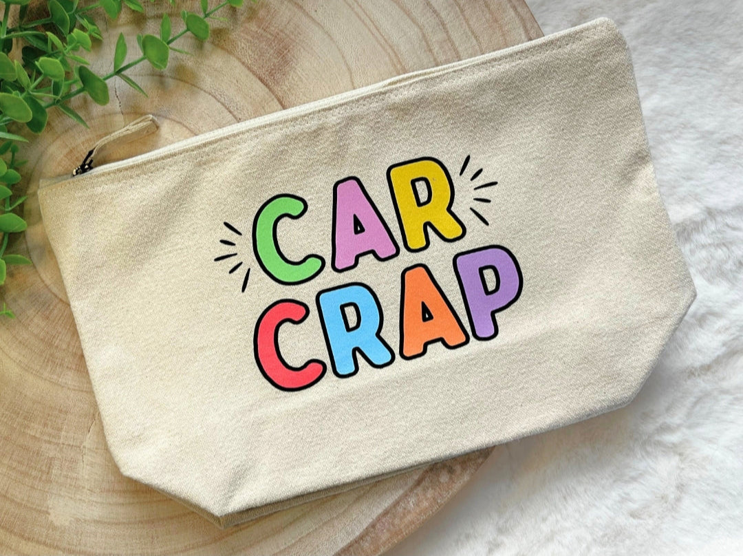 Beige pouch with 'CAR CRAP' in colourful letters