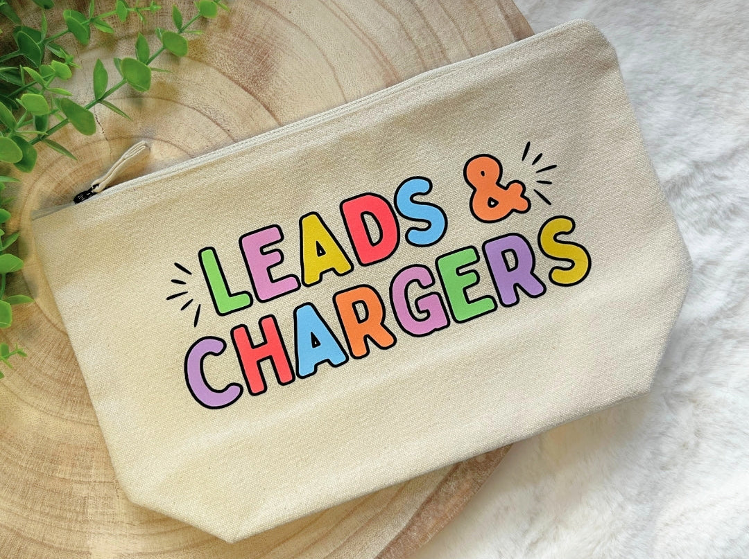 Canvas zip pouch with bold rainbow lettering “Leads & Chargers"