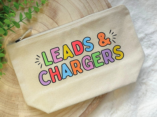 Canvas zip pouch with bold rainbow lettering “Leads & Chargers"